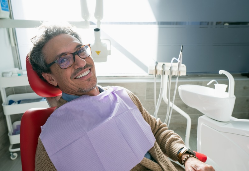Patient healthy smile after dental care procedure in Trenton, MI